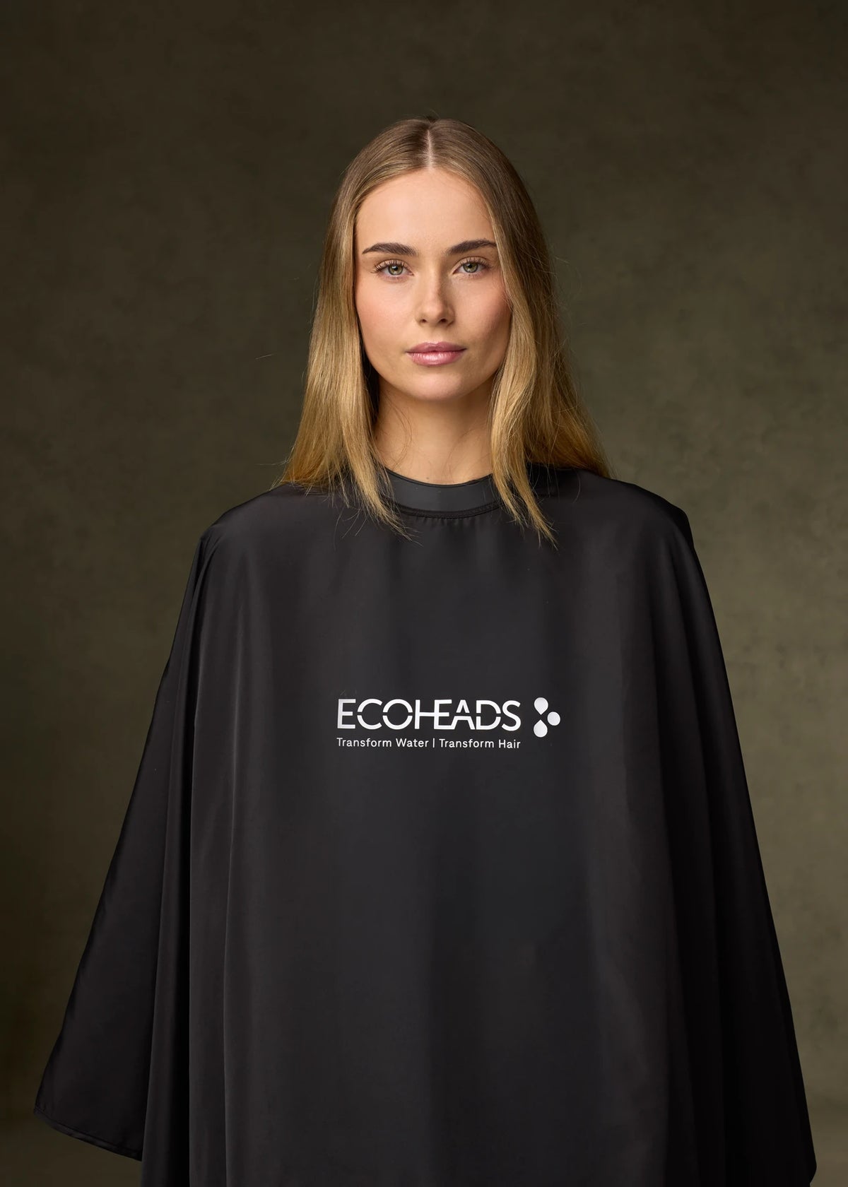 Model wearing an Ecoheads salon cape